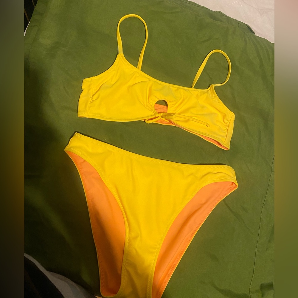 Two piece reversible color bathing suit, great condition never actually worn!